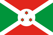 green-red triangles, white saltire, white circle, 3 red 6-pointed stars outlined in green