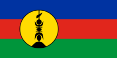 blue-red-green, black rooftop spire emblem, yellow disc