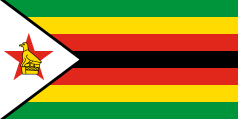 green-yellow-red-black-red-yellow-green, white triangle, black outline, red star, yellow bird